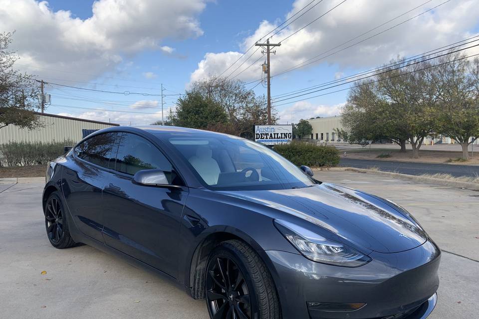 Updated Tesla, black wheels