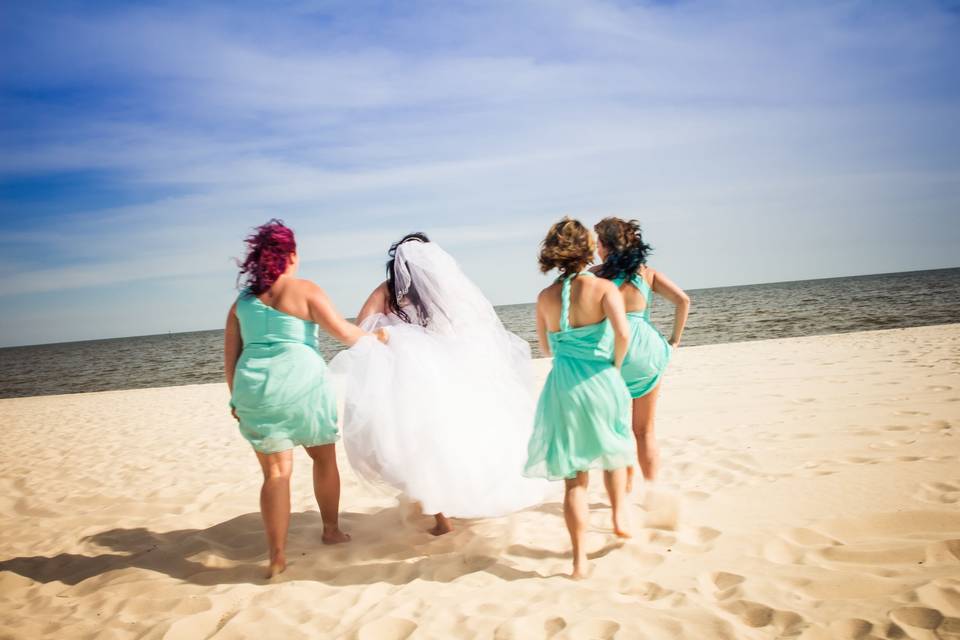 This is trash the dress moment at Biloxi Beach