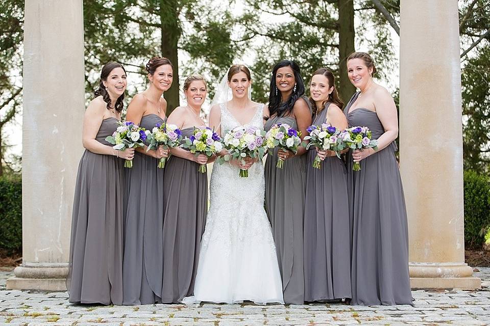 Bridesmaids gather in the courtyard at The Ashford Estate for photos with the bride