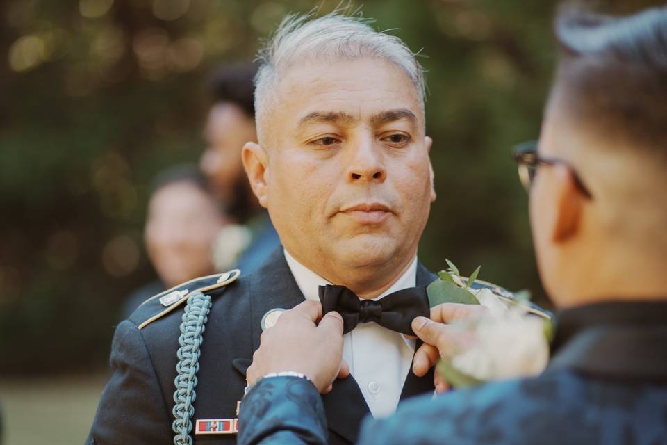 Groom helping Father
