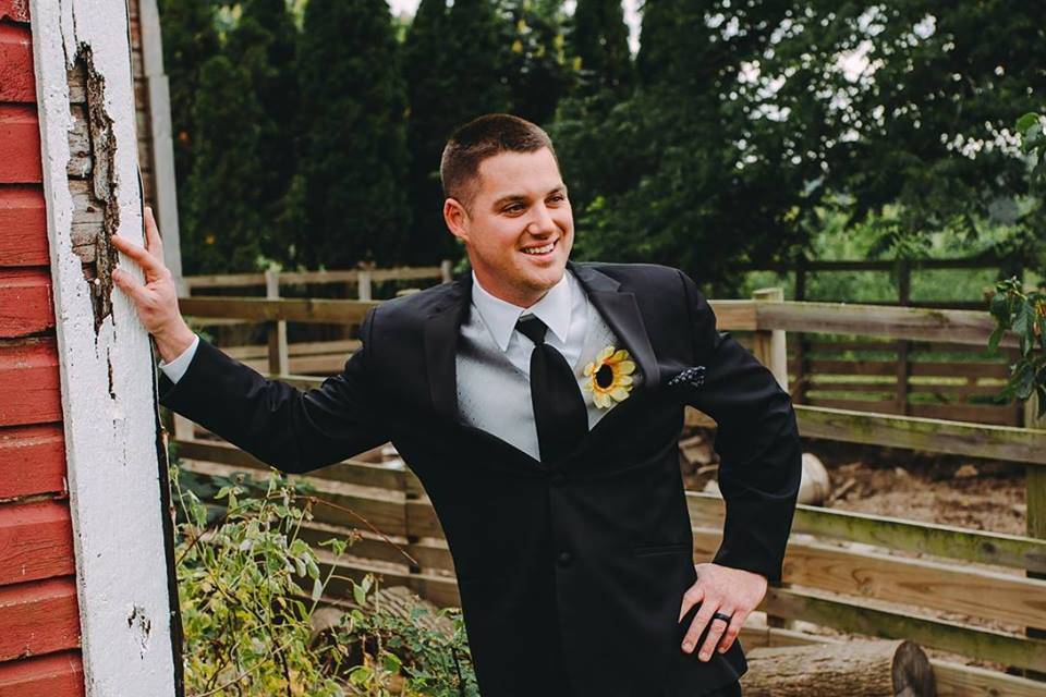 Groom with sunflower boutonniere