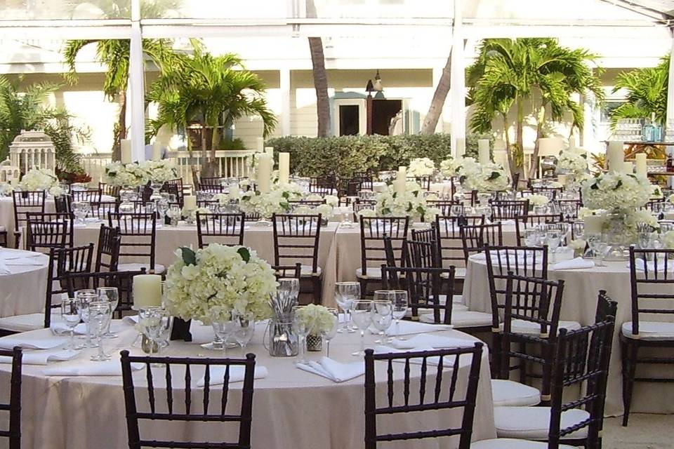 Reception tables and floral centerpieces