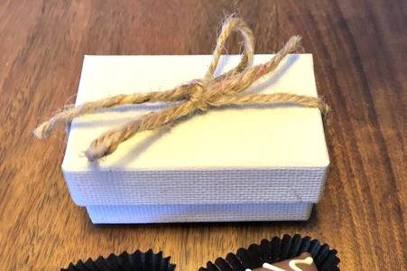 2 Piece assortment box of our Pistachio Orange Toffee and Apricot Brandy with a twine bow. $6 each