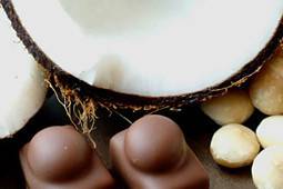 Kauai: Toasted coconut, dark rum and white chocolate ganache with a roasted macadamia nut wrapped in milk chocolate.