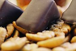 Maple Pecan: Virginia maple-milk chocolate ganache with toasted pecans, dipped in dark chocolate.