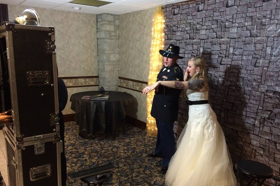 The bride and groom enjoying the photo booth!