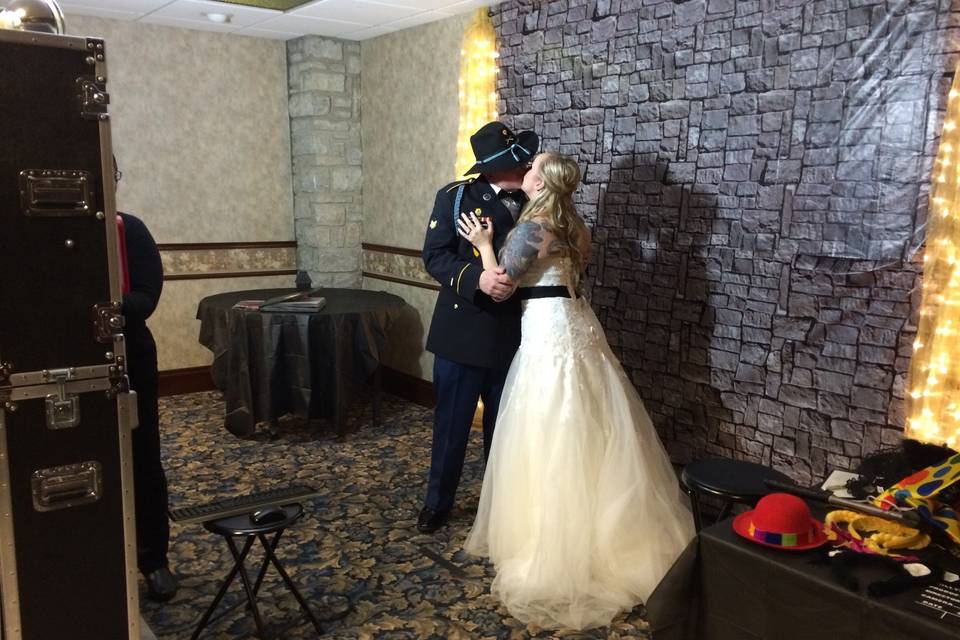 The bride and groom enjoying the photo booth!