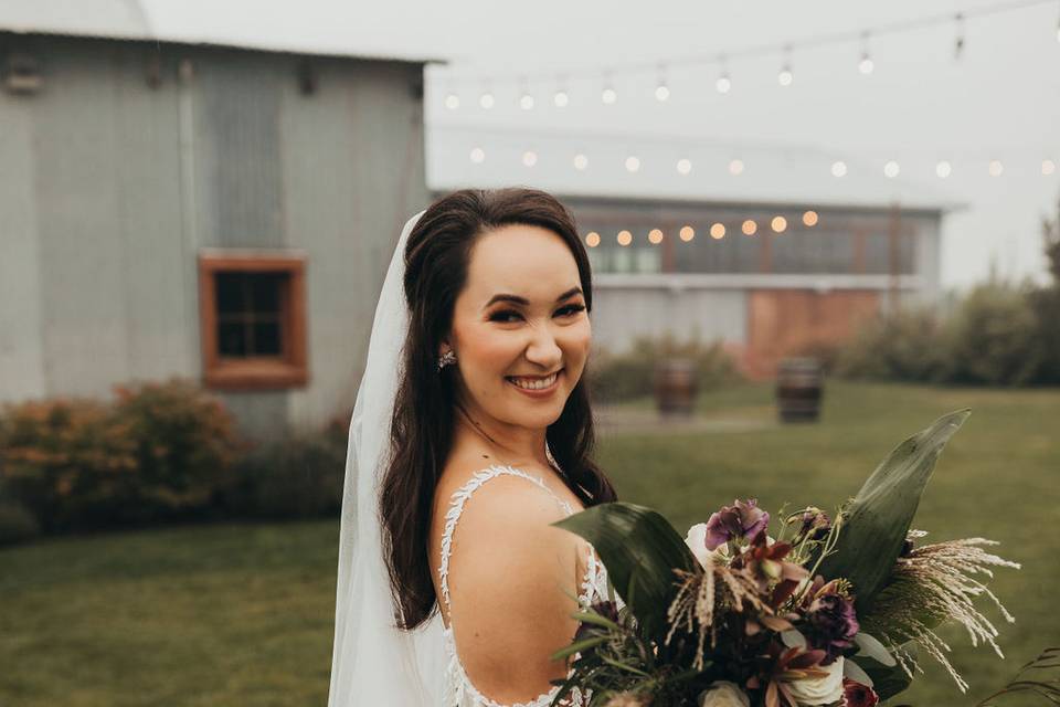 Beautiful bride on event lawn