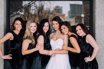 The bride with her bridesmaids far