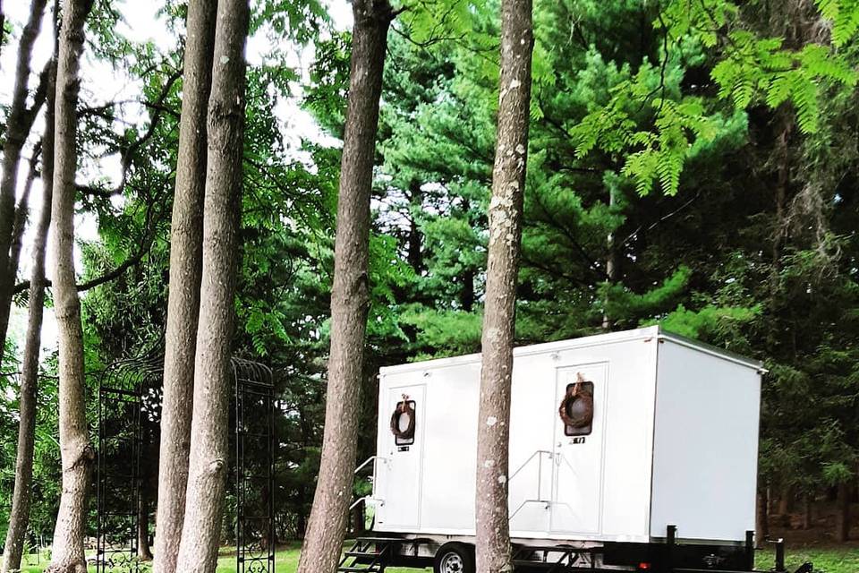 Portable restroom in the woods