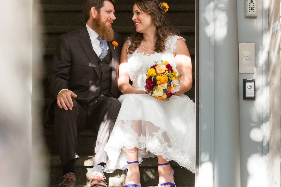 Bridge groom sitting doorway