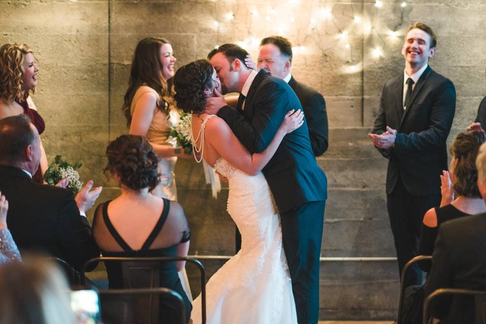 Bride groom kissing sparklers