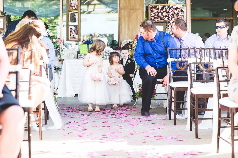 Flower girls at a garden wedding