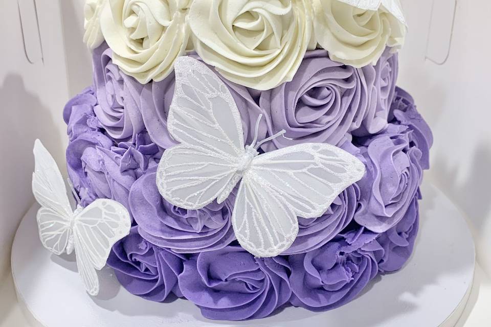 Ombre rosette tiered cake