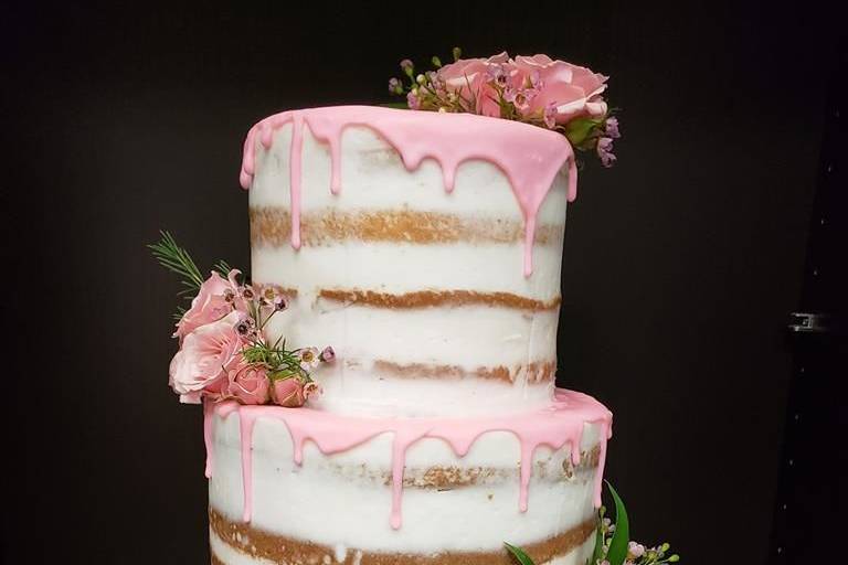 Naked cake with pink drip