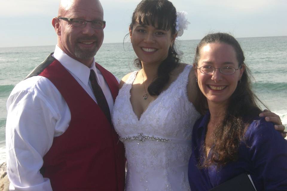 The newlyweds with the officiant