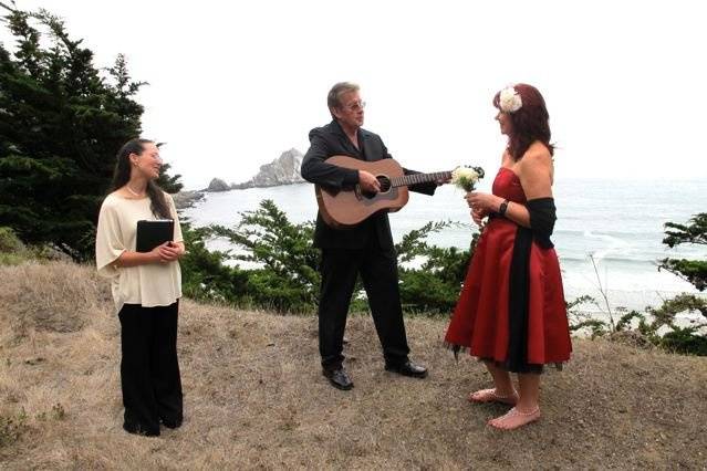 Groom playing music for his bride