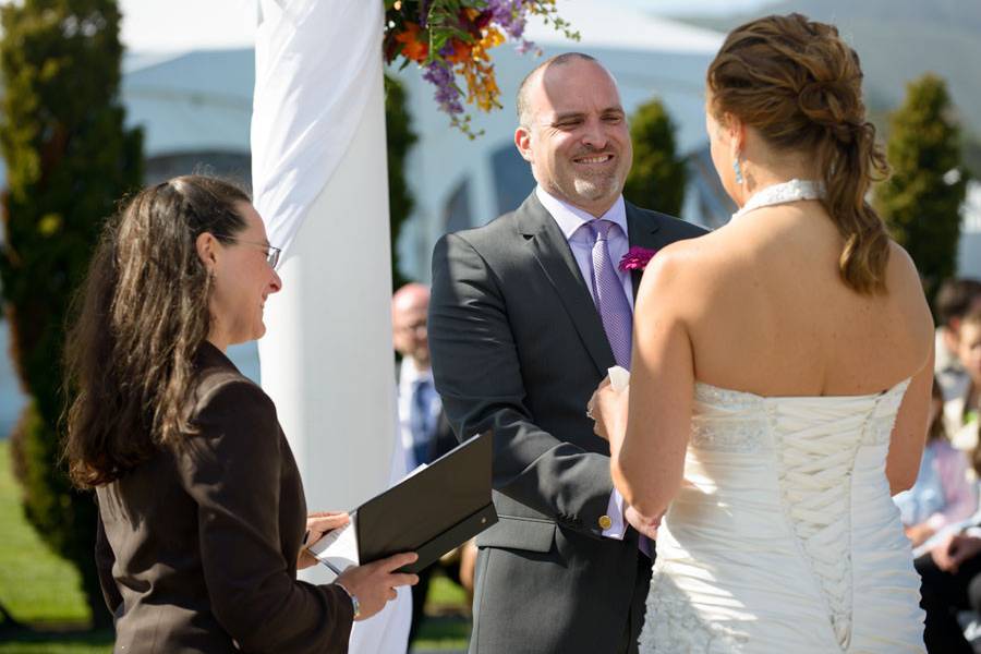 Grooms with the officiant