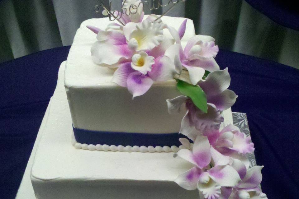 Three-tier floral wedding cake