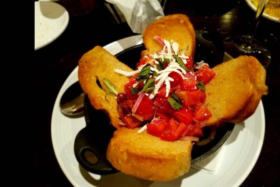 Try one of our small plates like the infamous Bruschette Siciliani. Yum!