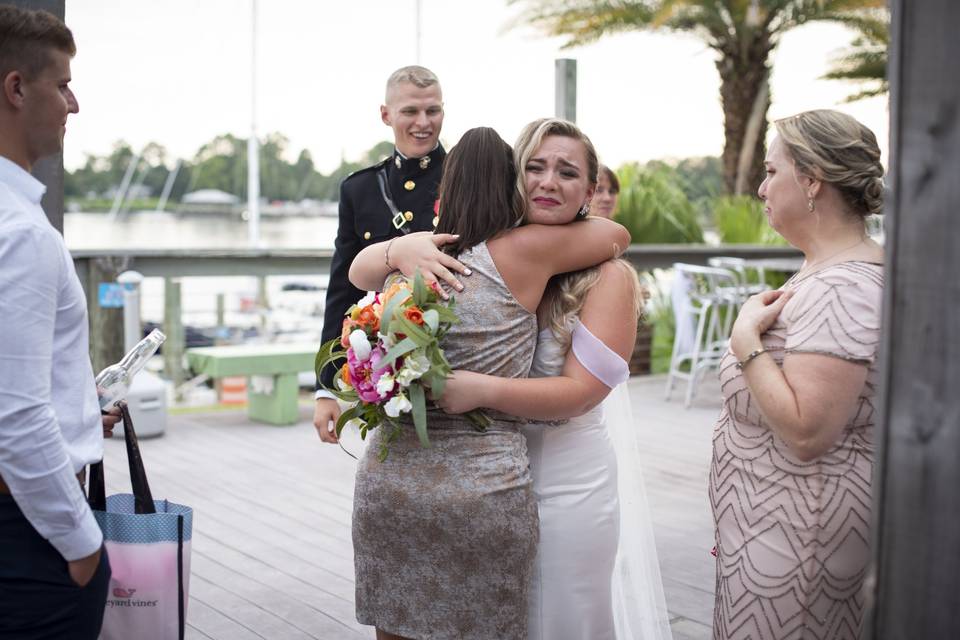 Bride hugging mother