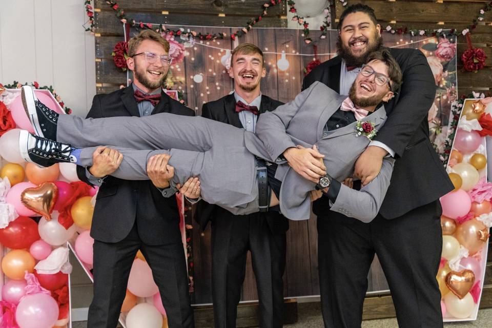 Groom picked up by the guys