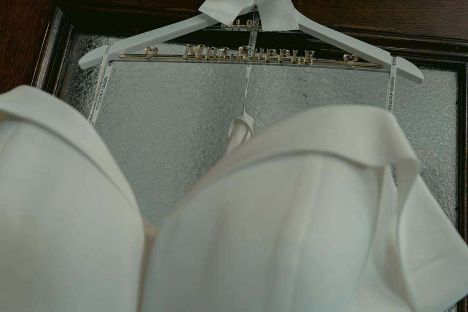 Wedding dress hanging on Door