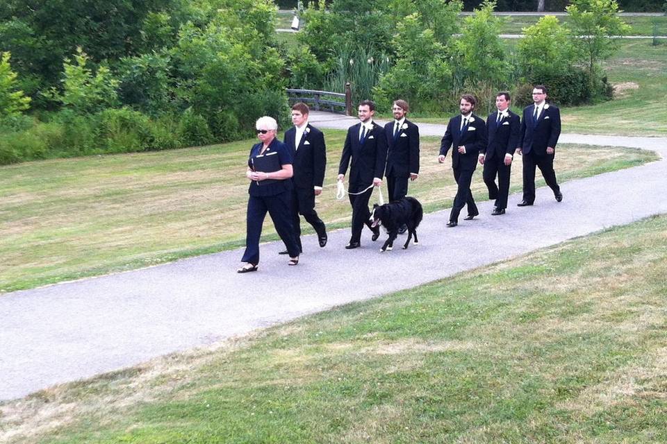 Rev Karen escorts the Groom and his groomsmen, and Issac the Ring Bearer.