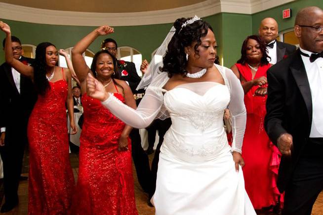 Dancing couple with their groomsmen and b