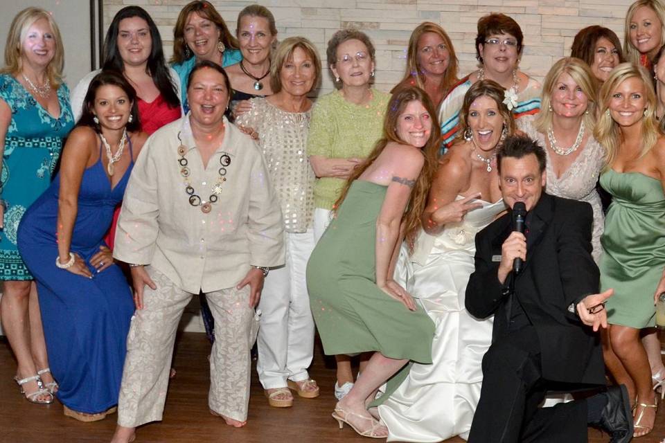 DJ Buddy gets in on the action with the bride and all the girls for a group shot at Royal Fiesta of Deerfield Beach!!  Let's Party!!!