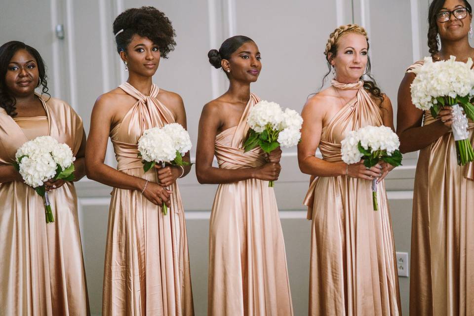 The bridesmaids and their bouquets