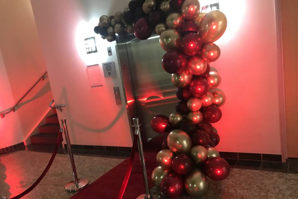 Balloon garland and red carpet