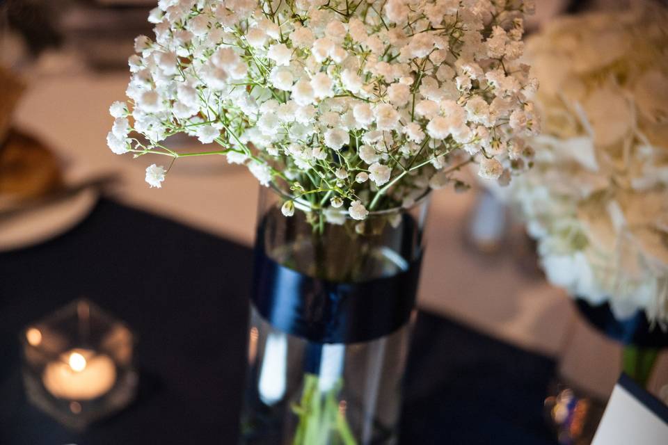 One of a set of 3 vases for the reception centerpiece tablesBeautiful Photo taken by Jennifer Jackson Photography - http://www.jennography.net