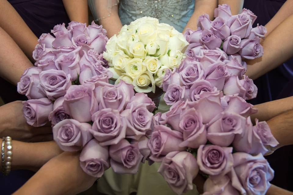 Summer bridesmaids' bouquets and bridal bouquet designed by L.A. Flowers, Inc.Beautiful Photo taken by Lena Lee Photography:  http://www.lenaleephotography.com
