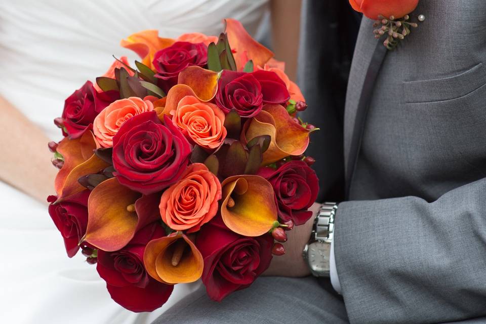 Bridal bouquet and boutonniere designed by L.A. Flowers, Inc.Beautiful photo taken by Lena Lee Photography - http://www.lenaleephotography.com