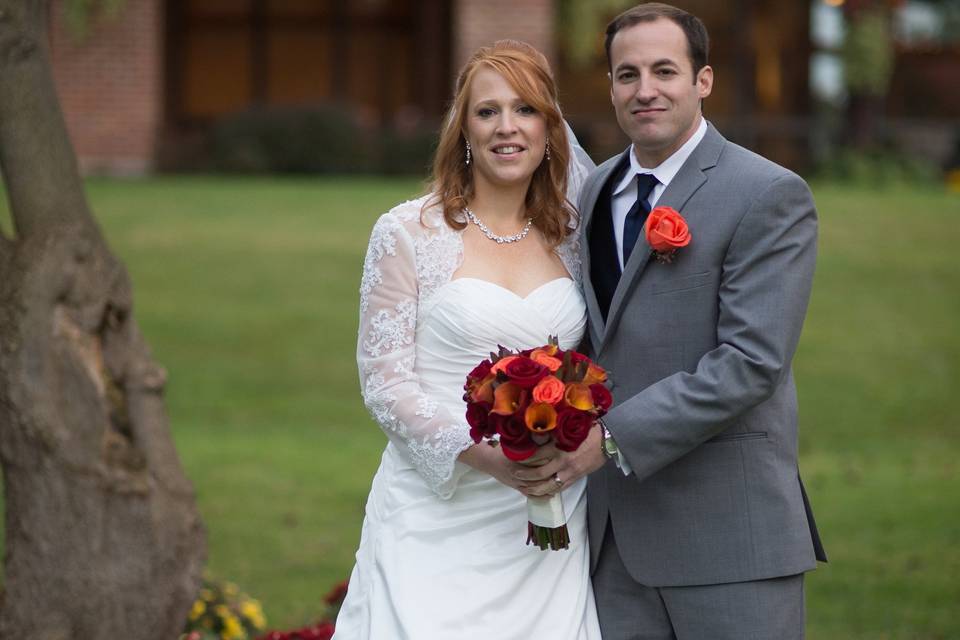 Bridal bouquet and boutonniere designed by L.A. Flowers, Inc.Beautiful photo taken by Lena Lee Photography - http://www.lenaleephotography.com