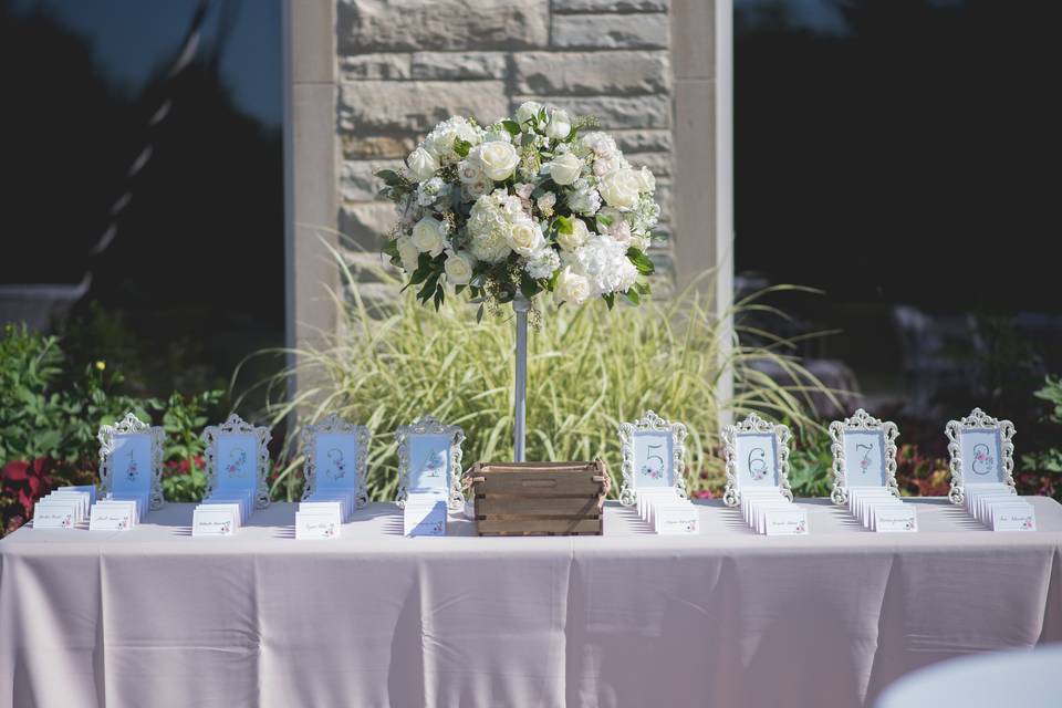 Large Place Card Table Arrangement Designed by L.A. Flowers, Inc.The Morton Arboretum Wedding LisleBeautiful Photo Taken by ReinRivera Photography http://www.reinrivera.com