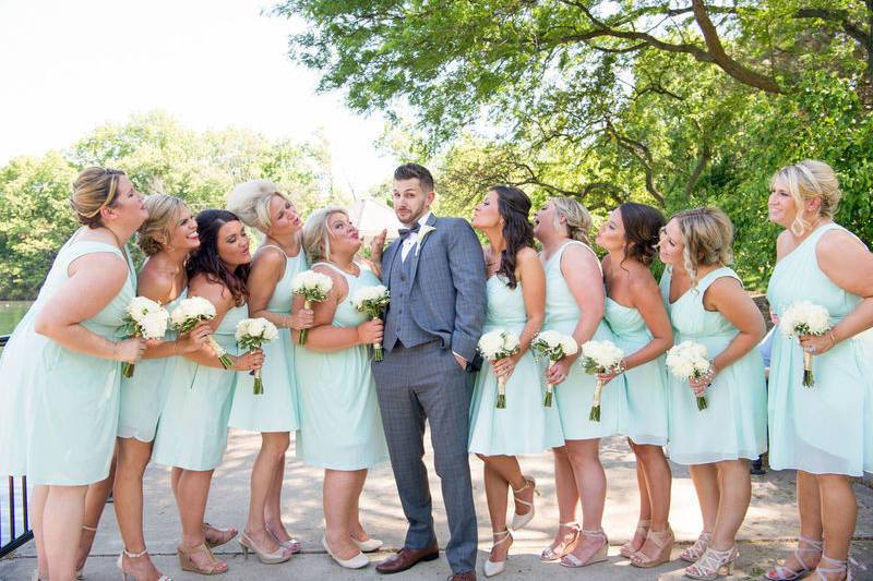 Bridesmaids' bouquets and boutonniere Designed by L.A. Flowers, Inc.Noah's Event Venue NapervillePhotographer:  George Street Photo and Video