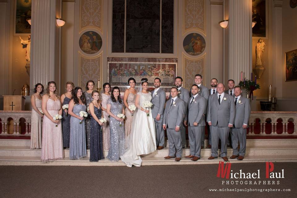 Bridal bouquet, bridesmaids' bouquets, groom and groomsmen's bouts designed by L.A. Flowers, Inc. Loews Chicago Hotel WeddingBeautiful photo taken by Michael Saukstelis of Michael Paul Photographershttp://www.michaelpaulphotographers