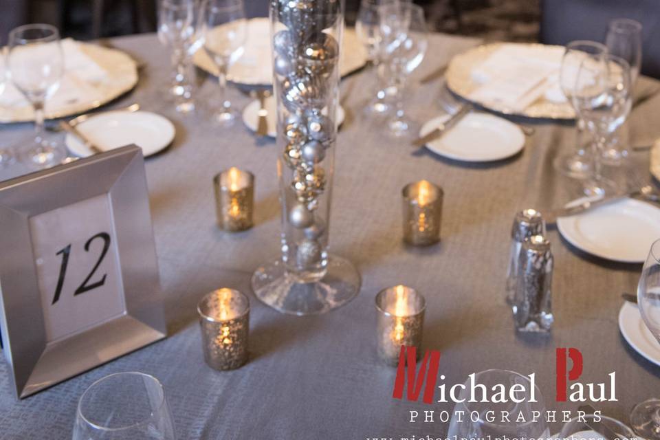 Reception Table Centerpiece designed by L.A. Flowers, Inc. Lowes Chicago Hotel WeddingBeautiful photo taken by Michael Saukstelis of Michael Paul Photographershttp://www.michaelpaulphotographers