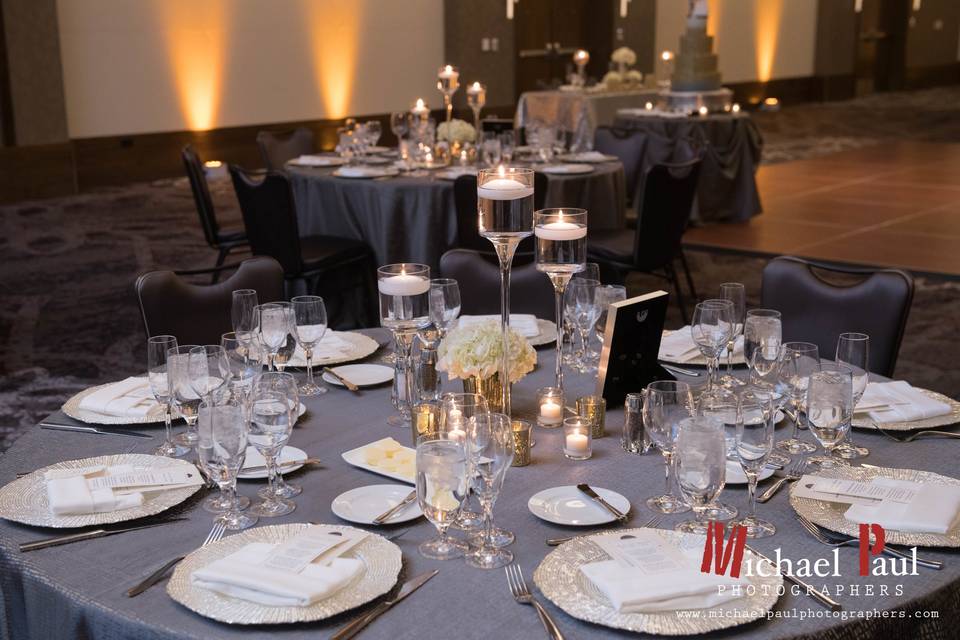 Short Reception Table Centerpiece designed by L.A. Flowers, Inc.Lowes Chicago Hotel WeddingBeautiful photo taken by Michael Saukstelis of Michael Paul Photographershttp://www.michaelpaulphotographers