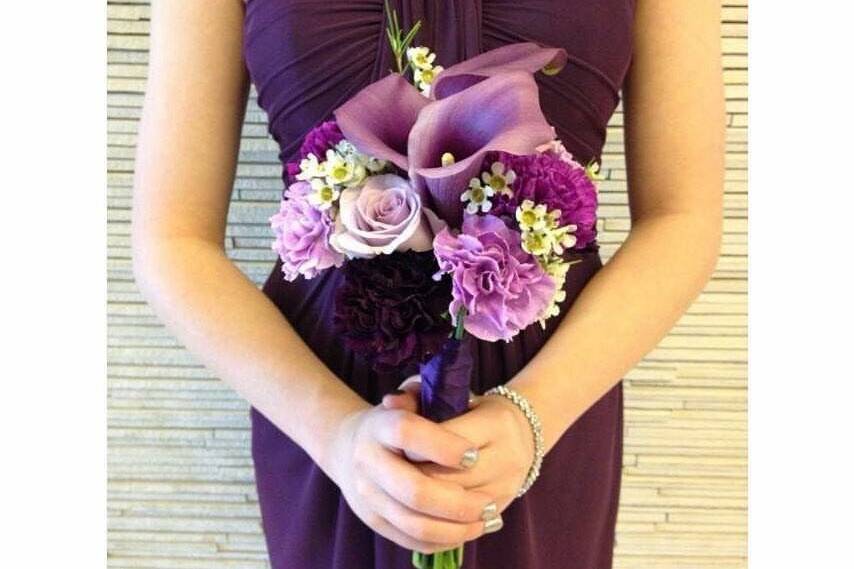 Bridesmaid’s bouquet designed by L.A. Flowers, Inc.The Marriot Chicago Naperville