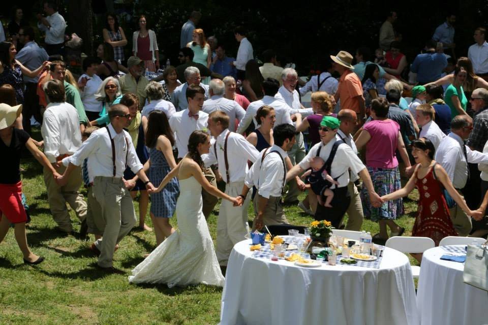 Traditional dancing taught and led by our banjo player. The setting is a green meadow with a mountain stream running by the dancers.