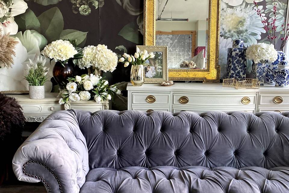 Grey tufted sofa