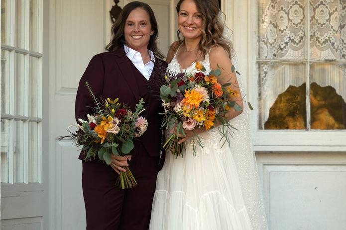 Bride in maroon suit