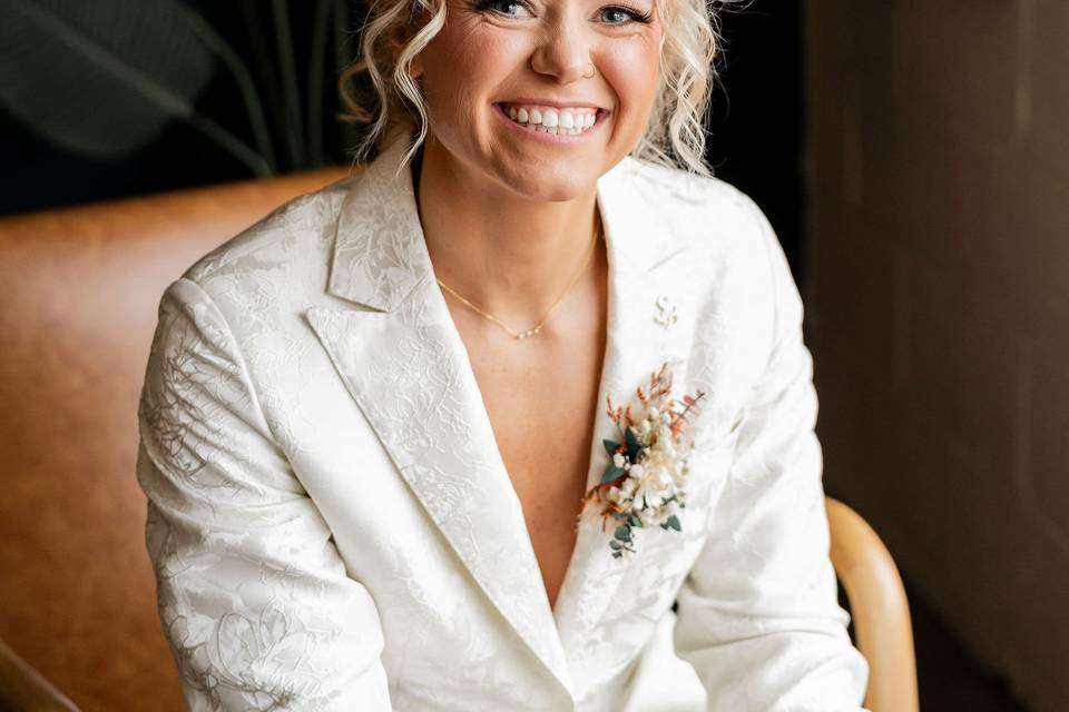 Bride in wedding jacket