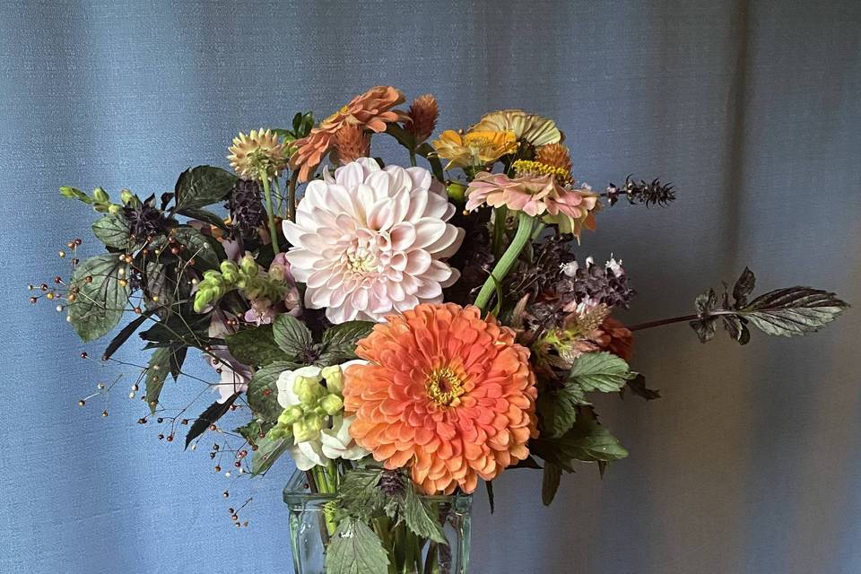 Arrangement with orange flowers