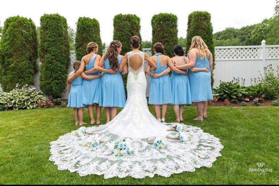 Bride, bridesmaids, and flower girl