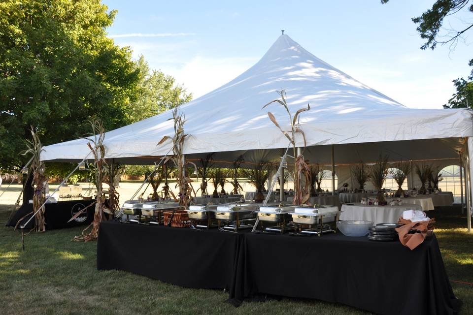 Add a tent for additional space and bring in the cater you feel will best fit your price point and theme.