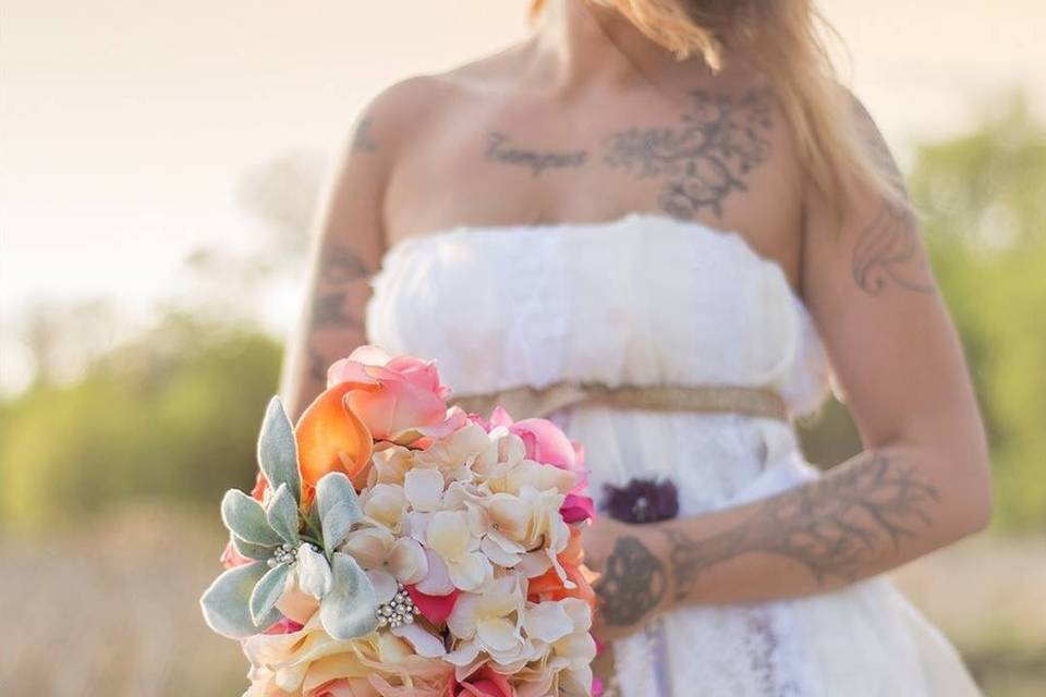 This semi cascading hydrangea, rose and lambs ear bouquet is still available to be made. Photo by MGE Photography, St. Louis